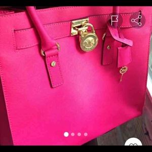 Micheal’s pink large Hamilton and matching wallet